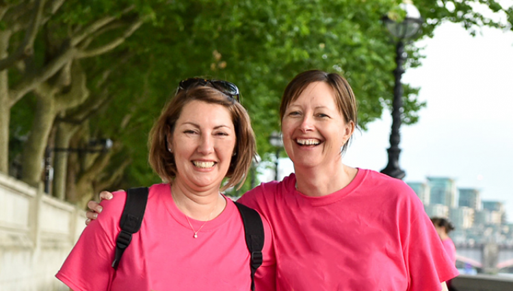 Two women in pink t-shirts